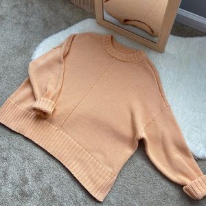 Bright orange sweater perfect for spring!